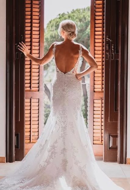 Bride from behind in lace dress