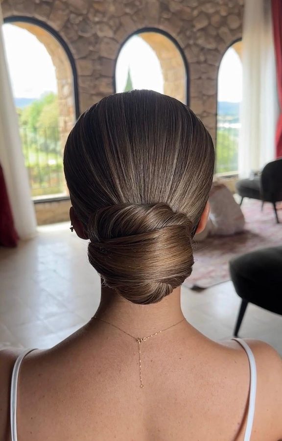 Sleek low chignon bun